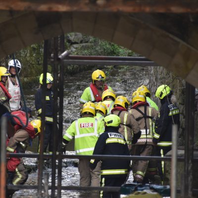 Carrying the man to the Helicopter